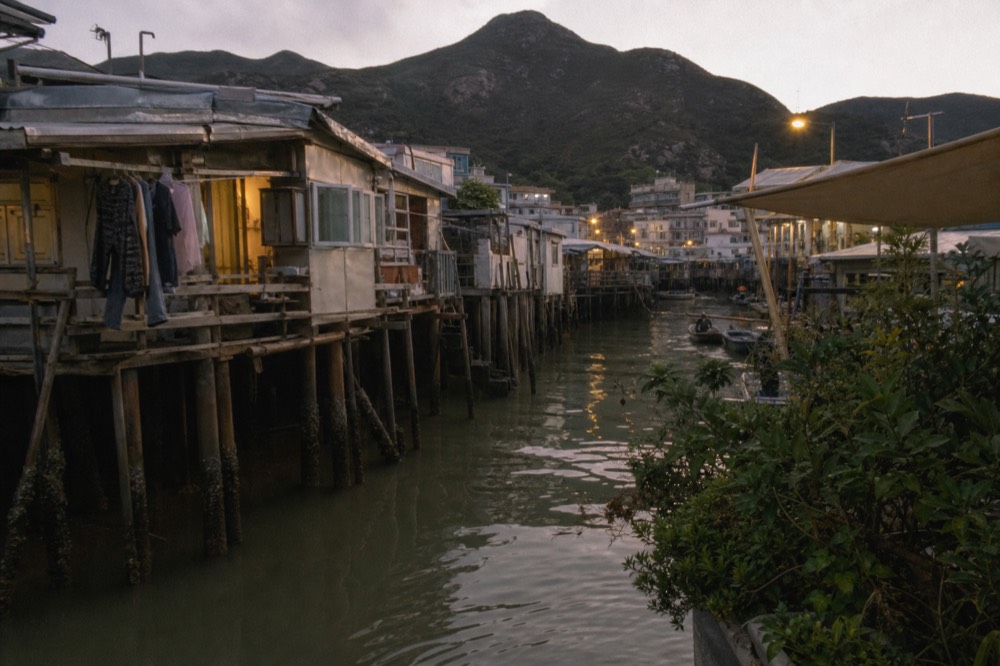 Wooden stilt houses along the Tai O waterways on Lantau, no text, no logos, no people