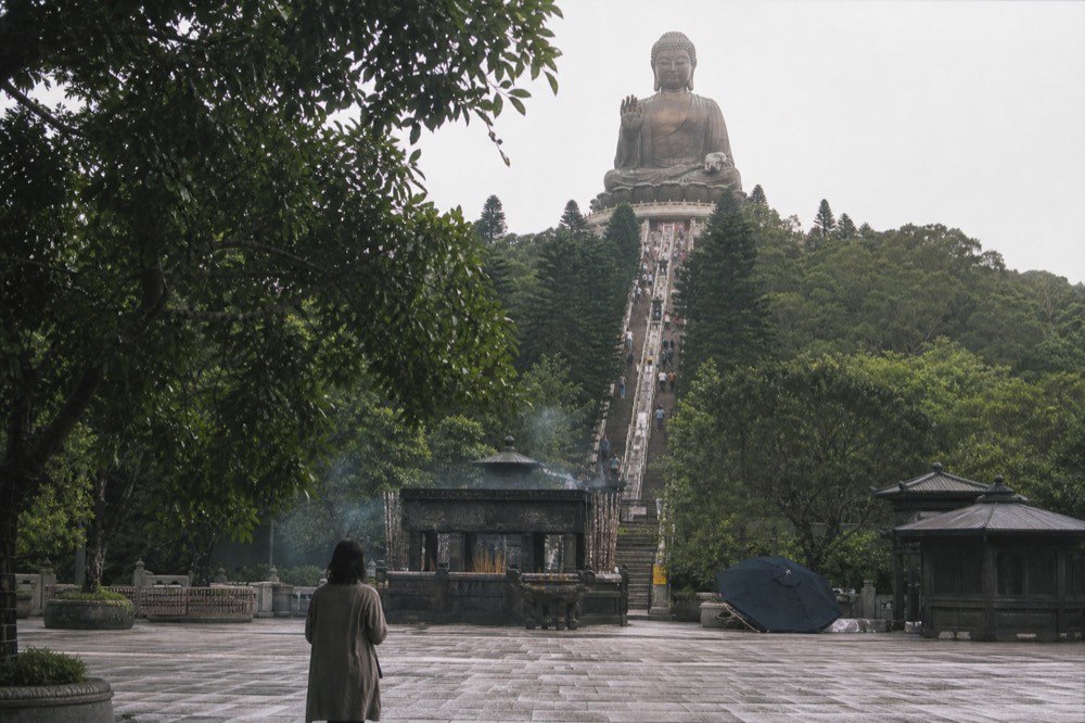 Big Buddha statue with steps leading up, no text, no logos, no people