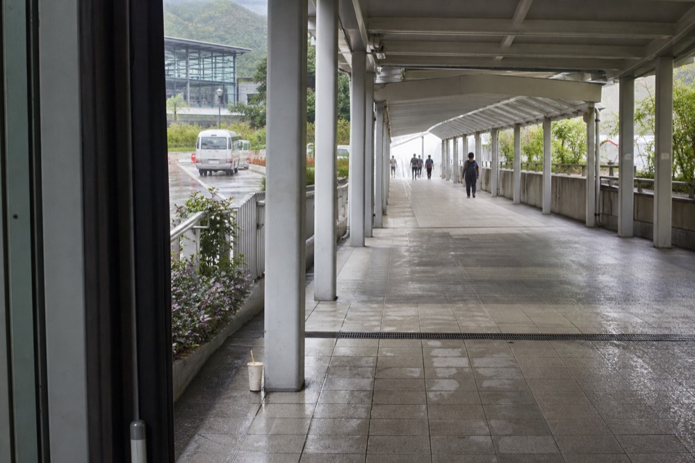 The covered walkway between Tung Chung station and the cable car terminal, no text, no logos, no people