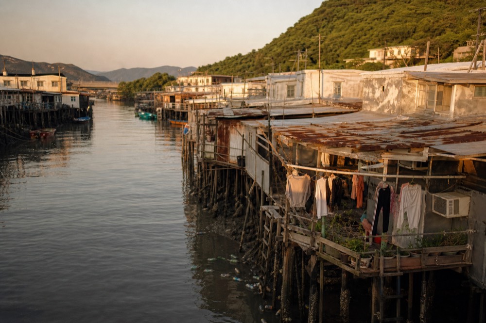 Stilt houses of Tai O fishing village standing over the water, no text, no logos, no people