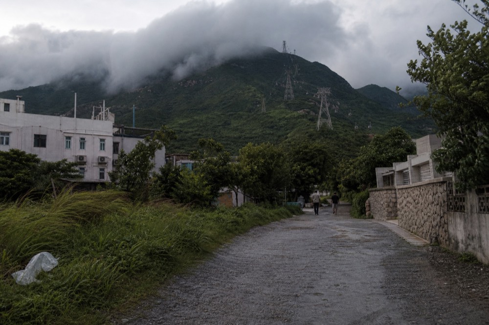Clouds moving across the Lantau plateau, no text, no logos, no people